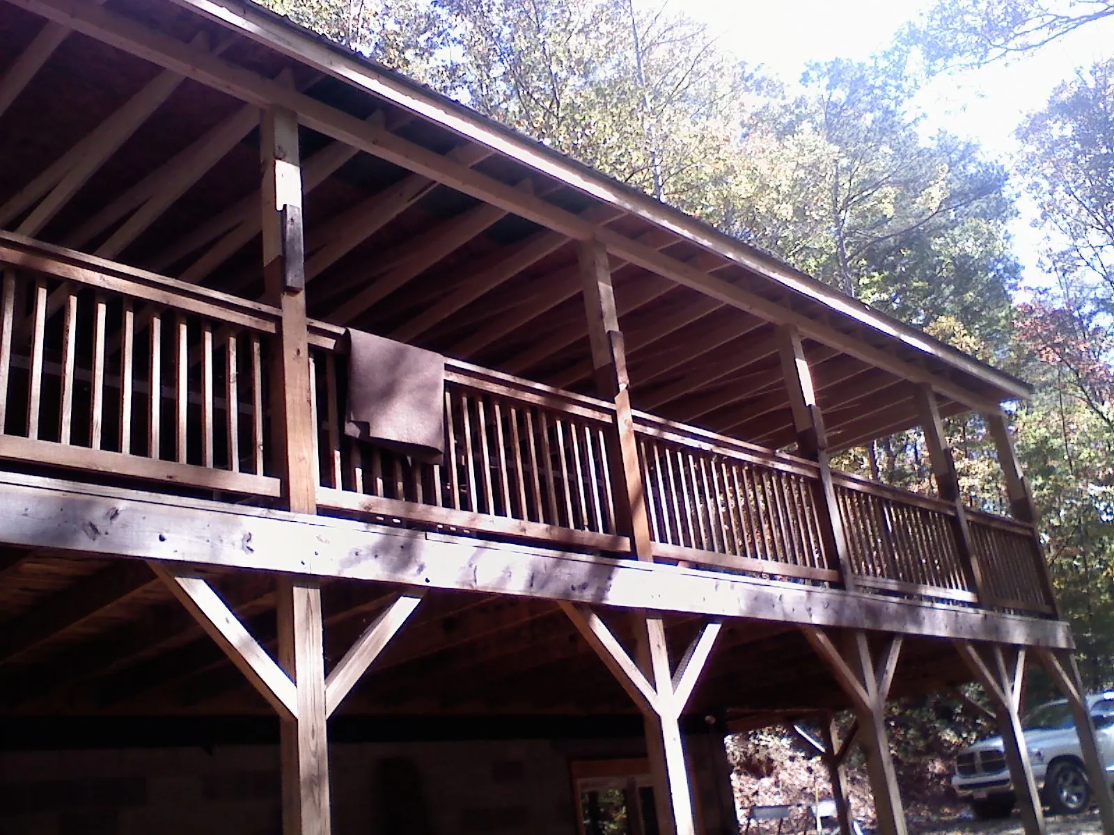 Timber framing under a new elevated porch and deck — Roof Leak Repair in Cobalt by Roofing Brothers